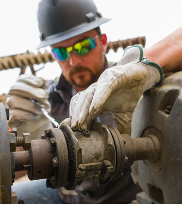Man maintaining machinery