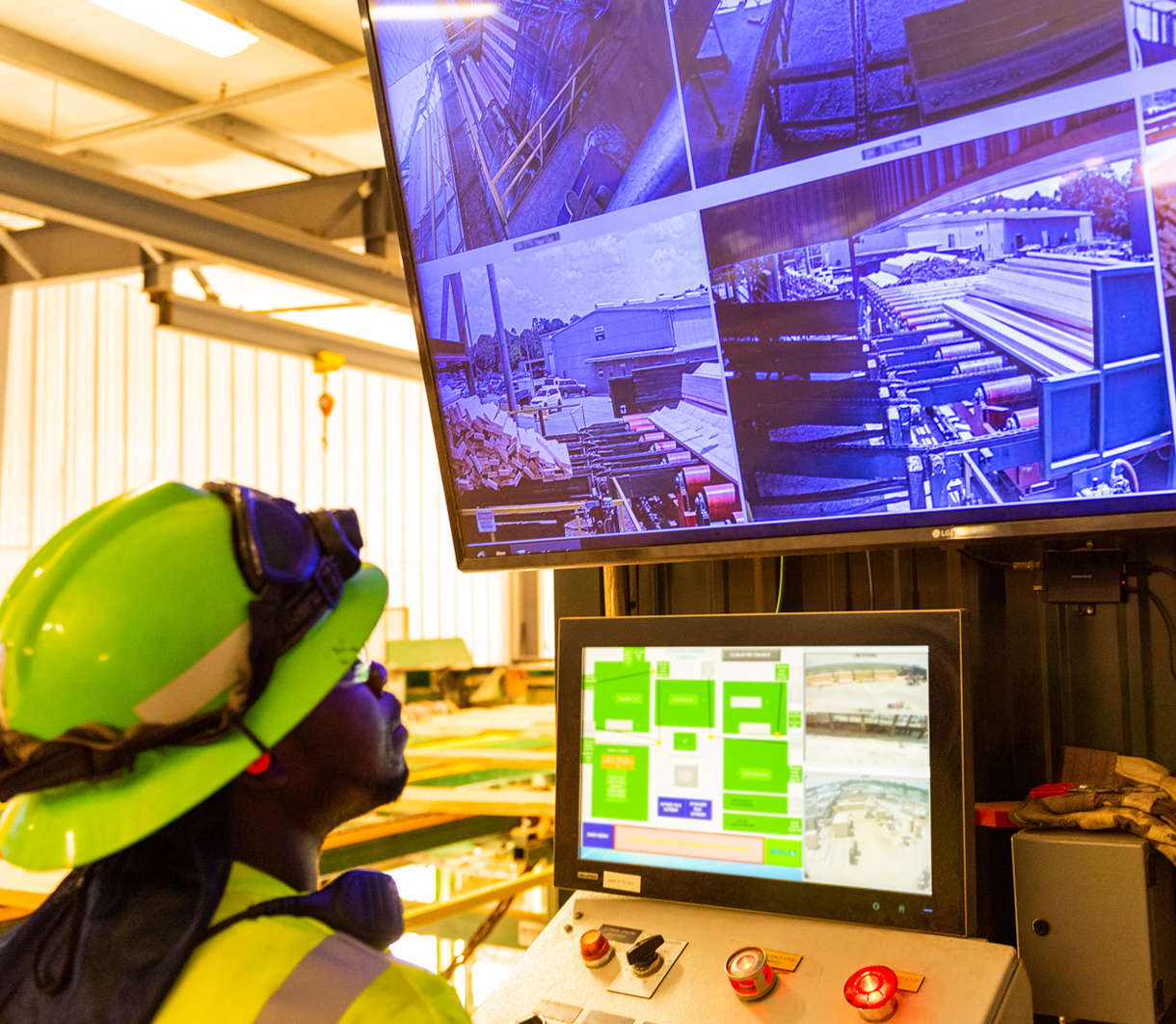 Man monitoring lumber yard