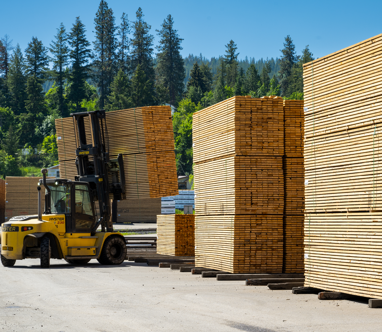 Forklift moving lumber